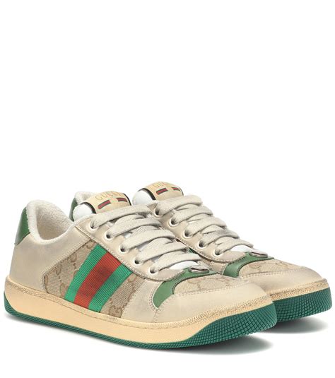 gucci screener sneakers.